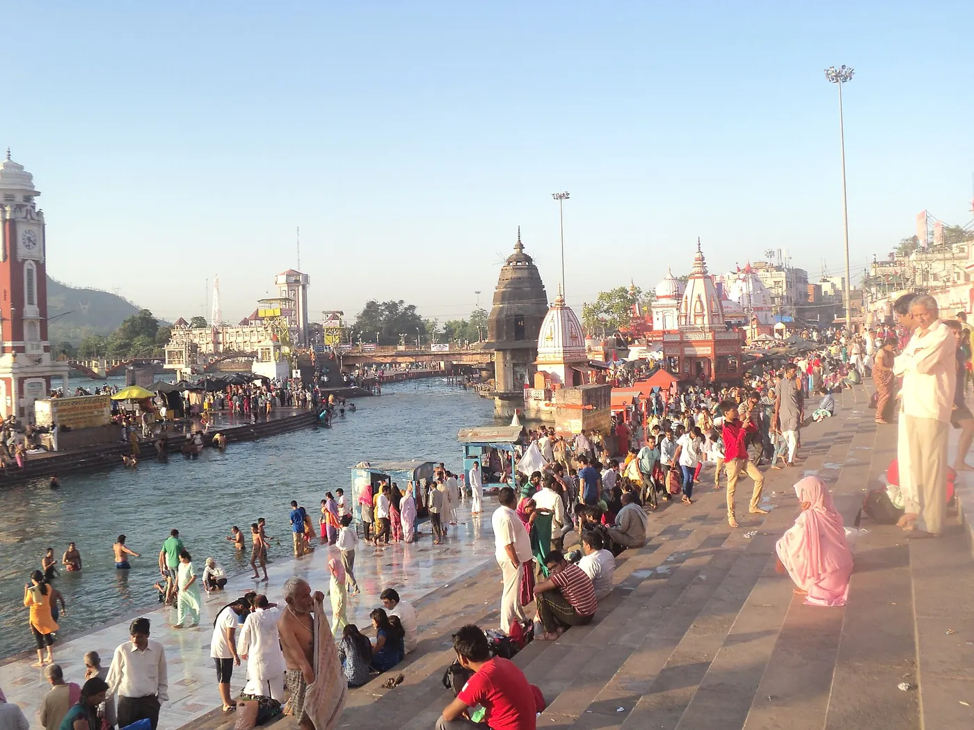 Pilgrims take a holy dip in the Ganga at sunrise.