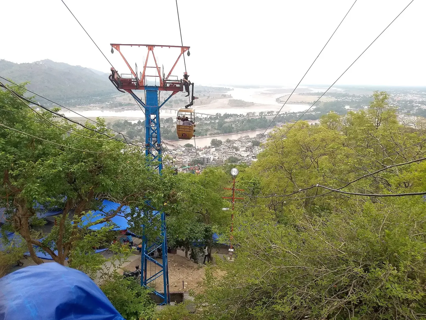 The ropeway up to Maa Mansa Devi's temple starts 13 minutes from us.